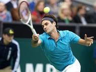 Swiss player Roger Federer returns a ball to France's Julien Benneteau in Rotterdam on February 15, 2013